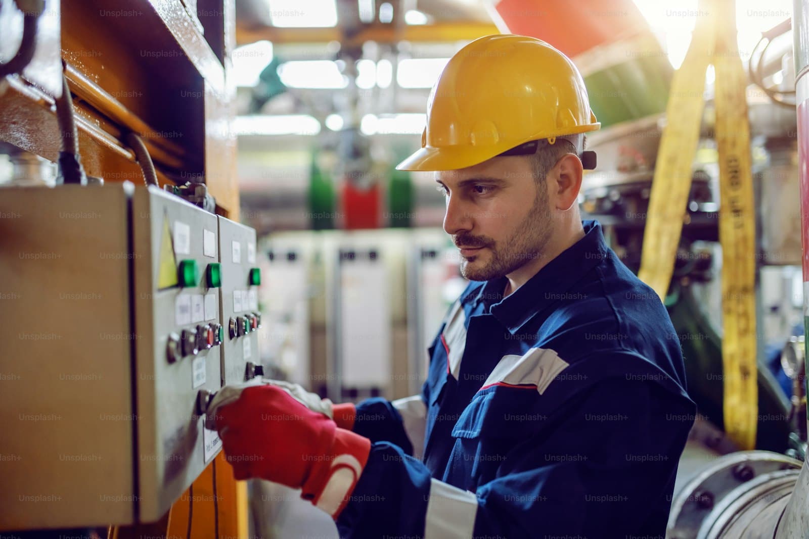 Electrician energizing a plant switchboard