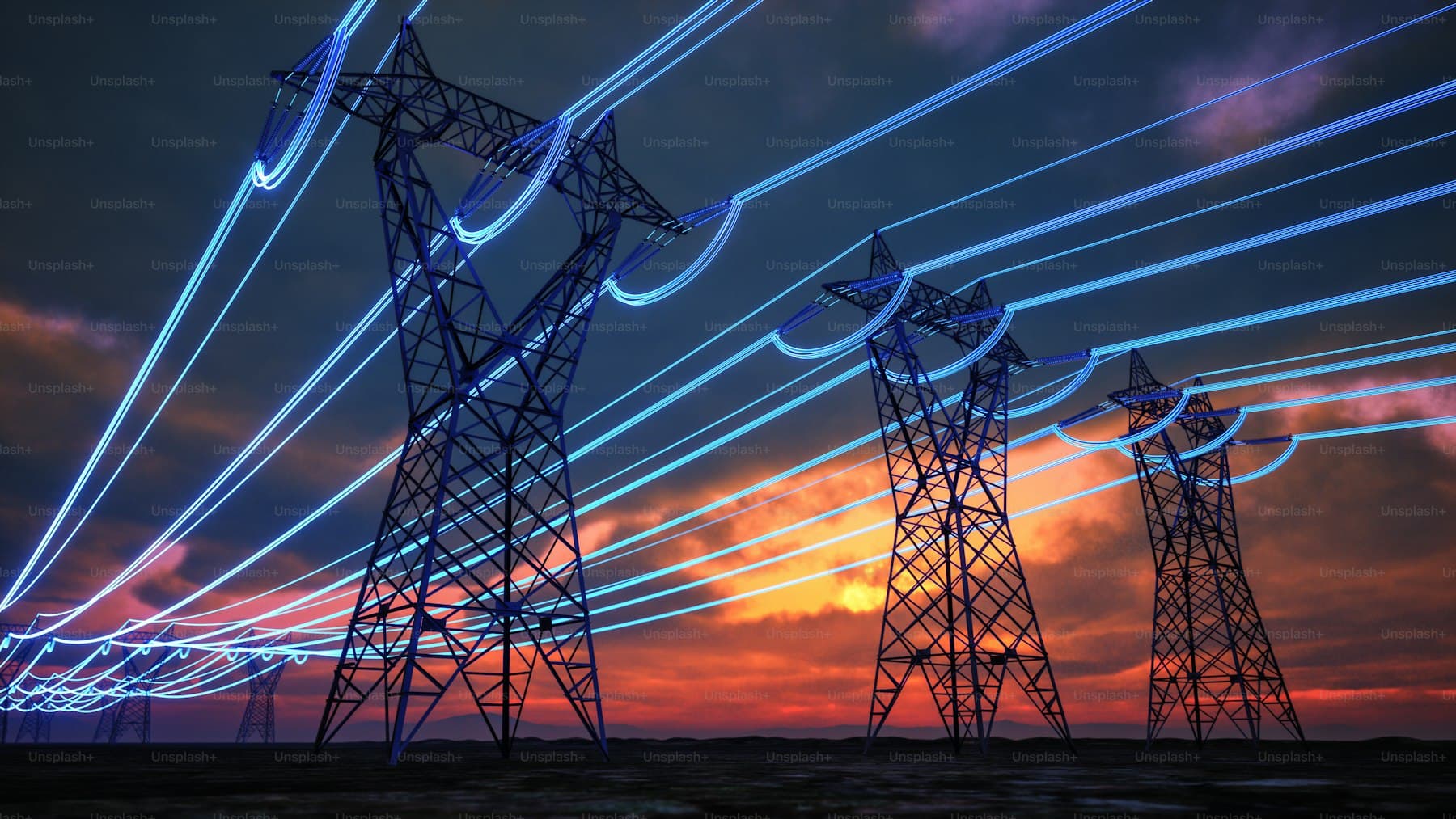 Transmission towers at dusk